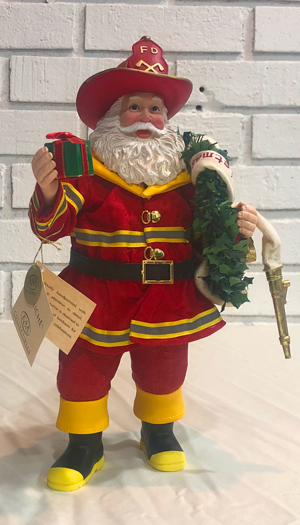 Fabriche Fireman Santa w/Wreath & Hose